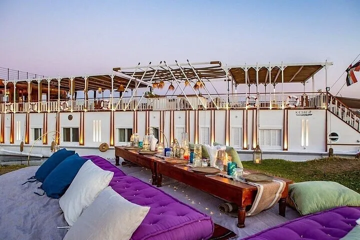 Cushioned lounge seating on the sun deck of a dahabiya on a luxury Egypt tour, Nile, Egypt
