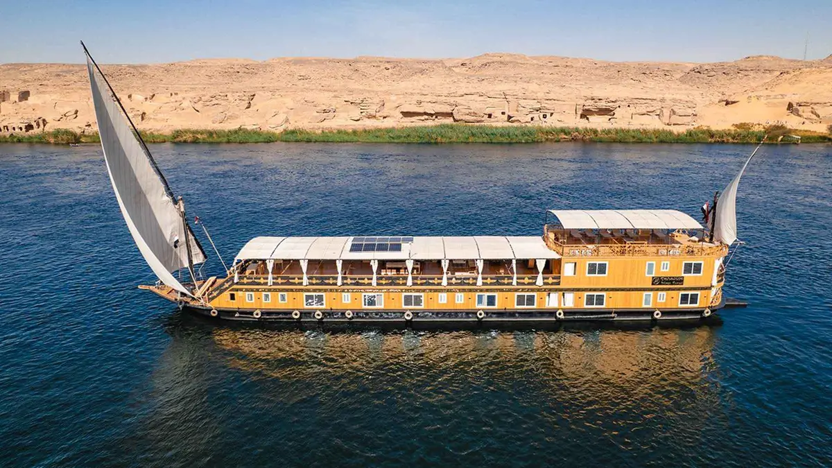 A two-masted dahabiya under sail between Aswan and Luxor on a luxury Egypt tour, Nile, Egypt