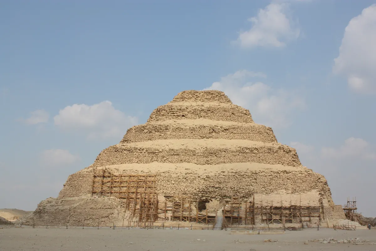 The Step Pyramid of Djoser standing above the desert on a luxury Egypt tour, Saqqara, Egypt